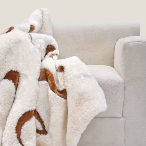 A warm and soft blanket for a sofa or bed, design and comfortable.