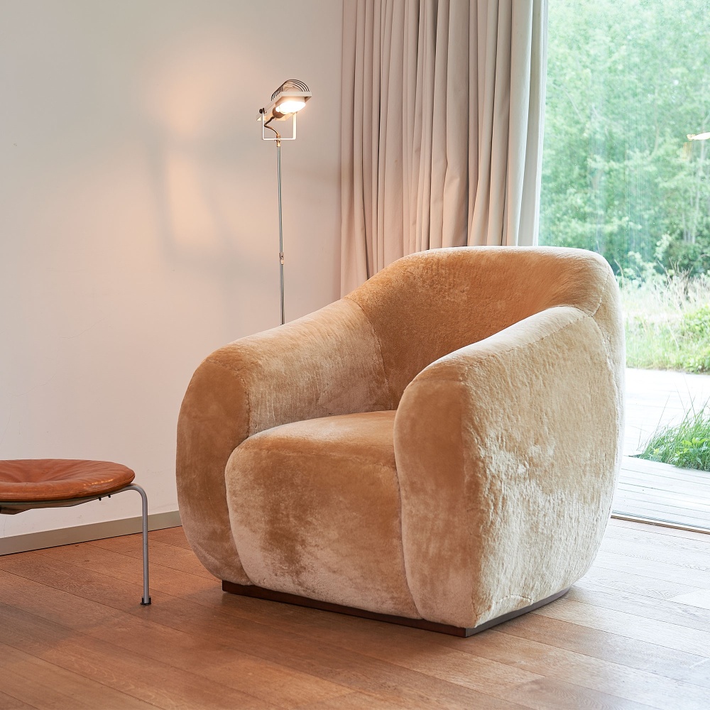 Coco Beige armchair in an elegant design.