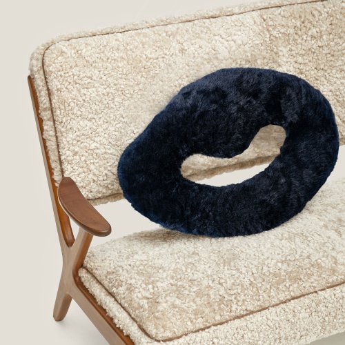 Navy-blue Fluxus cushion in a vintage mood.