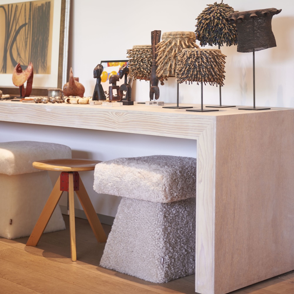 Luxurious stools covered in hide, vintage furniture, collection of African art for this contemporary decoration