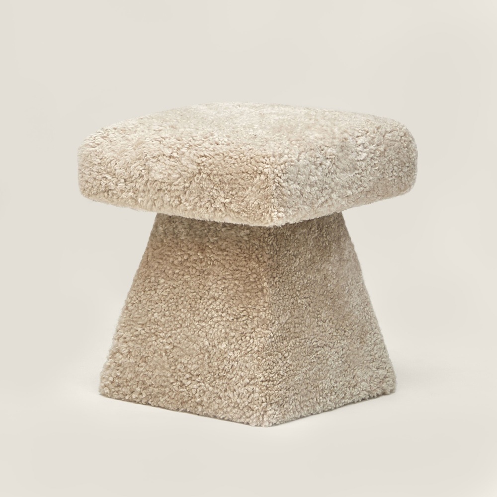 Shop online a small chic and modern stool covered in beige shearling