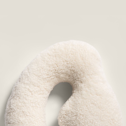 An organic, comfortable shape for our Fluxus White cushion.