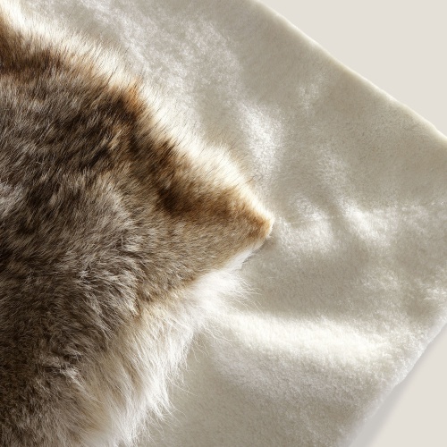 Shearling and fur, luxurious materials for this Norki rug.