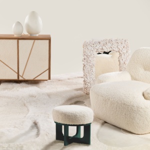 Buy a small designer nomadic furniture, wooden base green pouf with a comfortable white seat by Norki