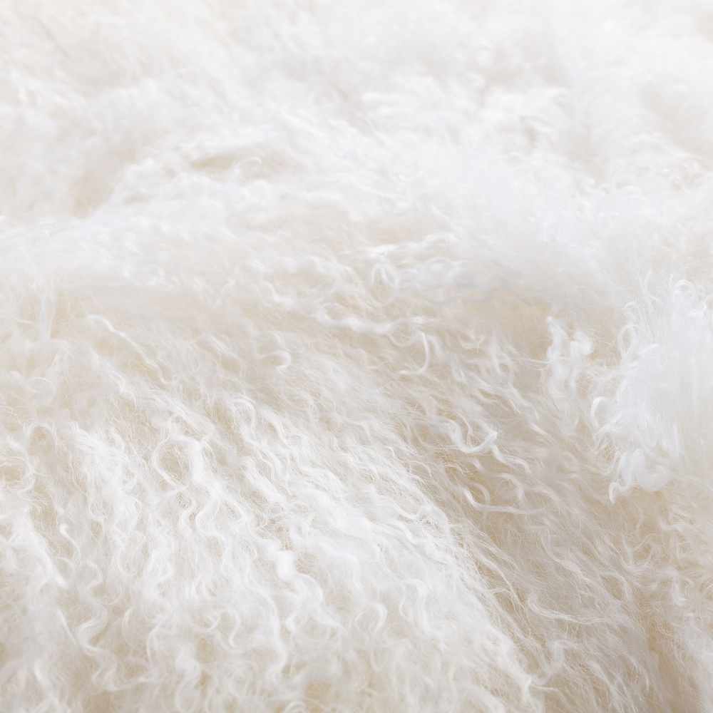 Comfort, softness and warmth for this high-end, fully lined white rug