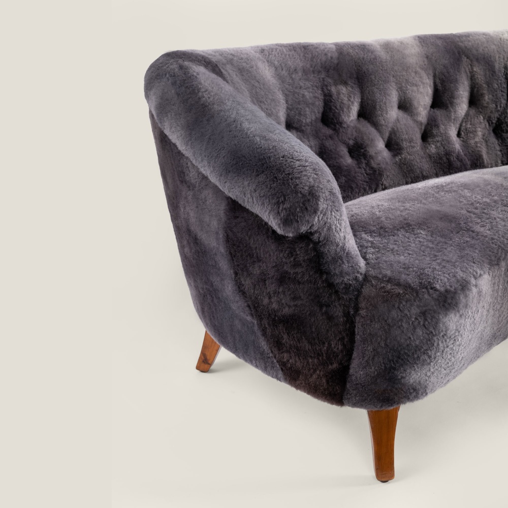 Buy a small confortable vintage sofa in gray wool skin to decorate your home