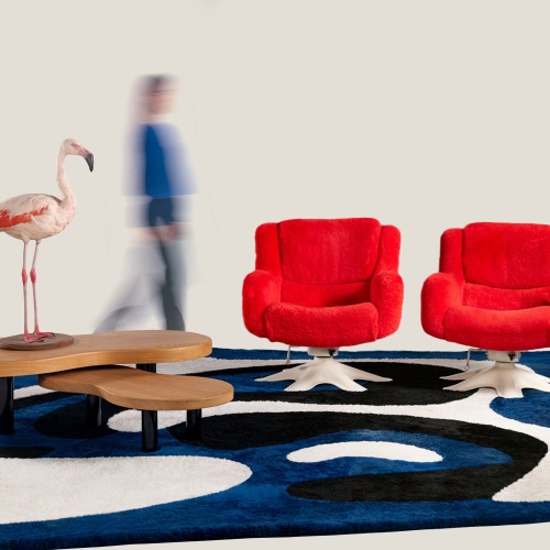 A stylish decoration with a large, contemporary and bold colorful rug by Norki