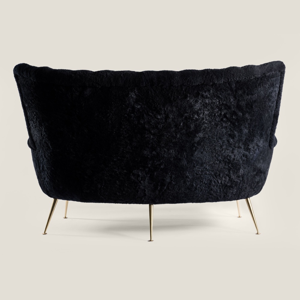 Buy a unique piece of furniture, a small black sofa restored by the Alsatian upholsterers of Norki