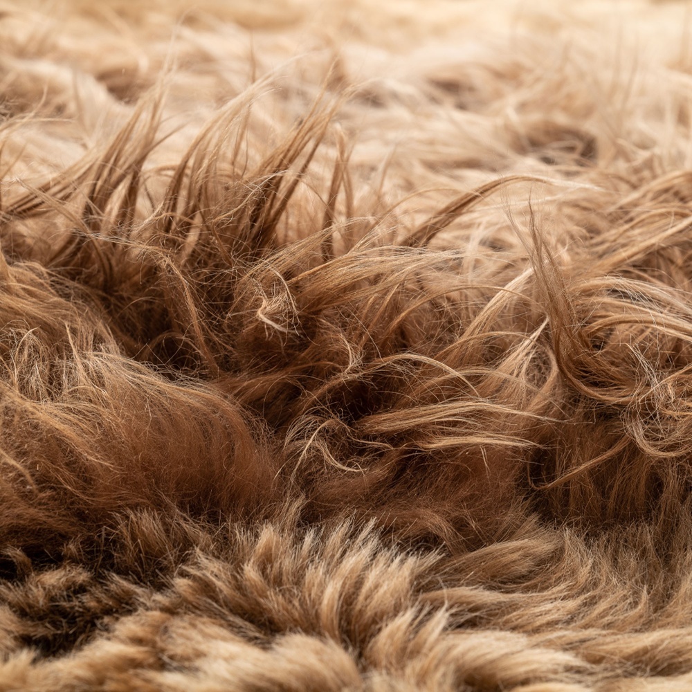 Warm, thick and soft rug made in France in sheepskin