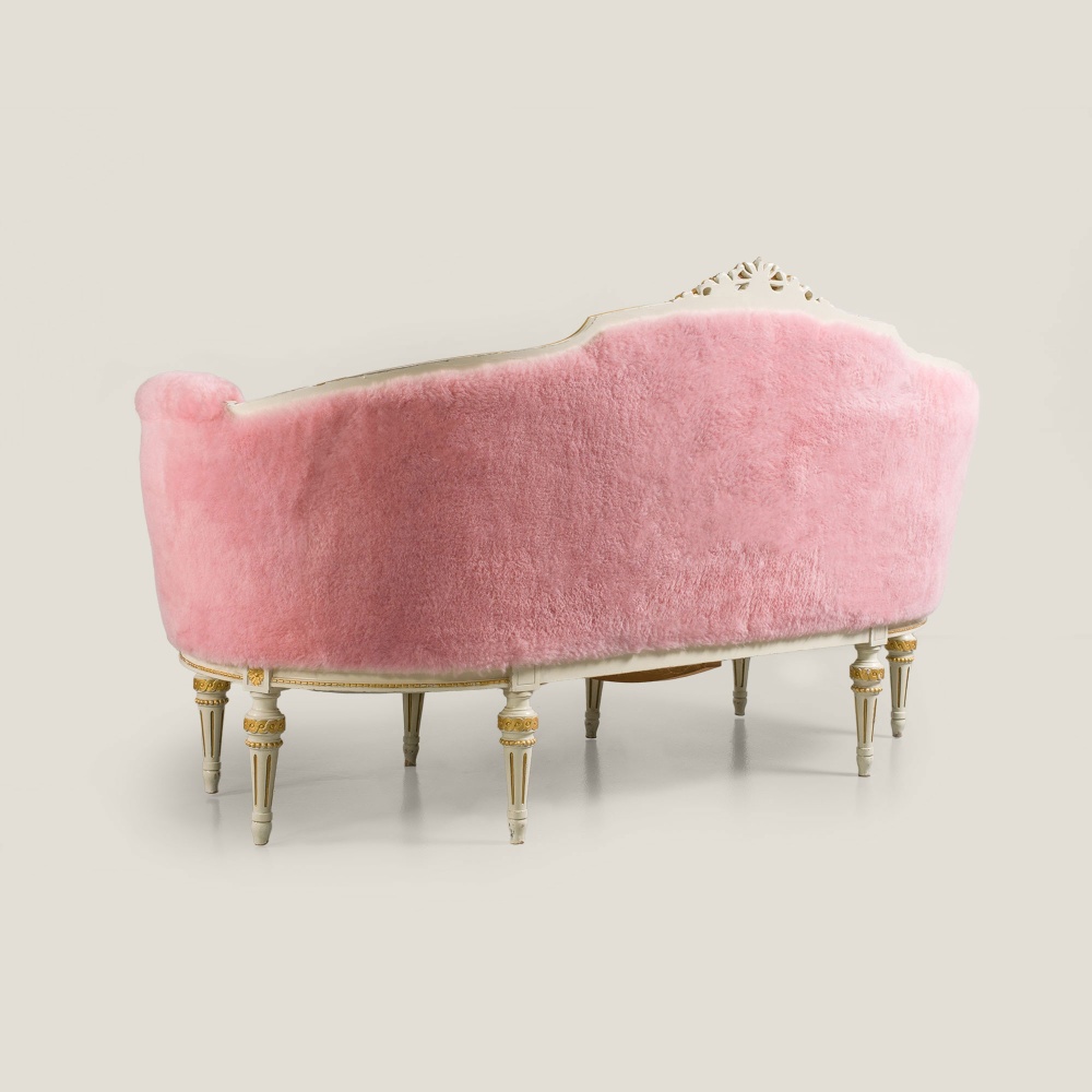 Vintage pink sofa to decorate a feminine bedroom or a baby's sweet nursery