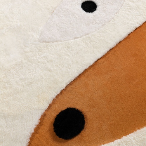 Carpet with a natural white and black sheepskin pattern, and Orange dyed foal inspired by a ceramic