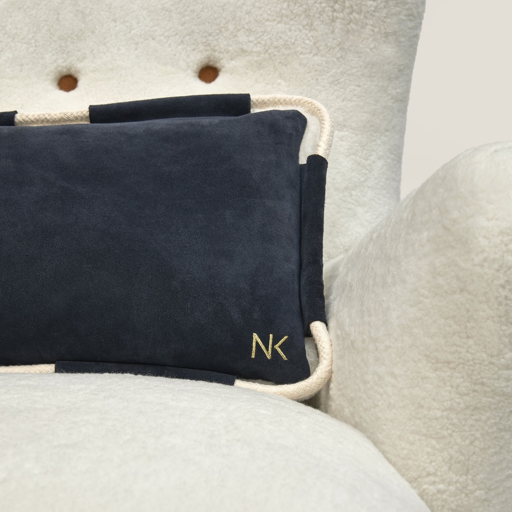 Notre coussin Strandkorb 100% made In France, en peau.