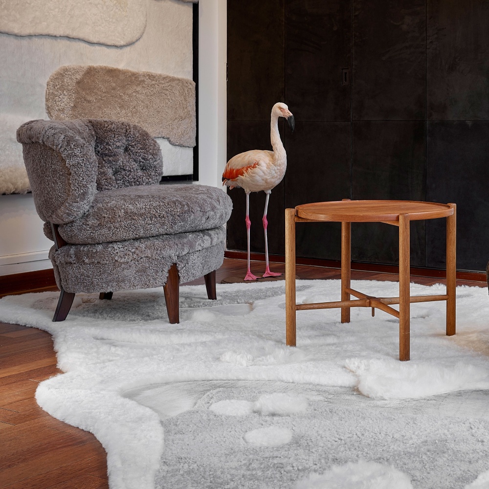 Side table designed by Hans J. Wegner for Andreas Tuck with an organically shaped rug