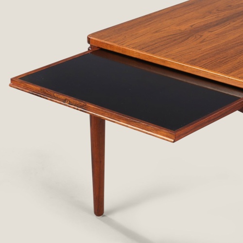 Vintage rosewood coffee table with an integrated sliding black formica top