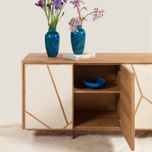 High-end wooden furniture and blue vases.