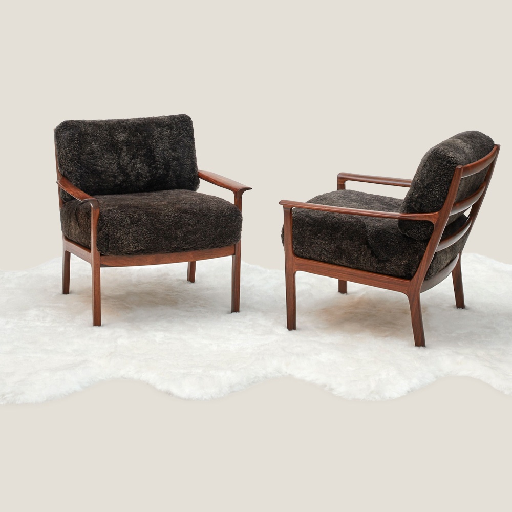 Vintage Scandinavian Lounge Chairs by Broderna Andersson and natural-shaped sheepskin rug