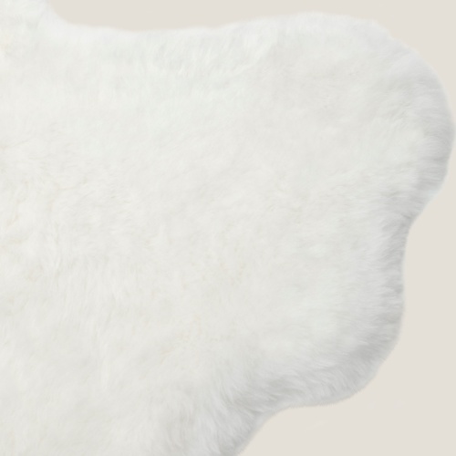 Natural white sheepskin rug, available in other colors and in any custom size.