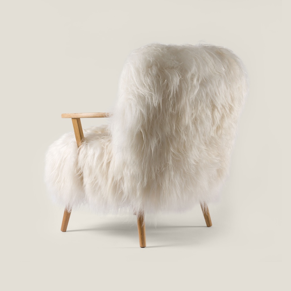 Luxury furniture in natural white long-haired sheepskin, handmade in our French workshop.