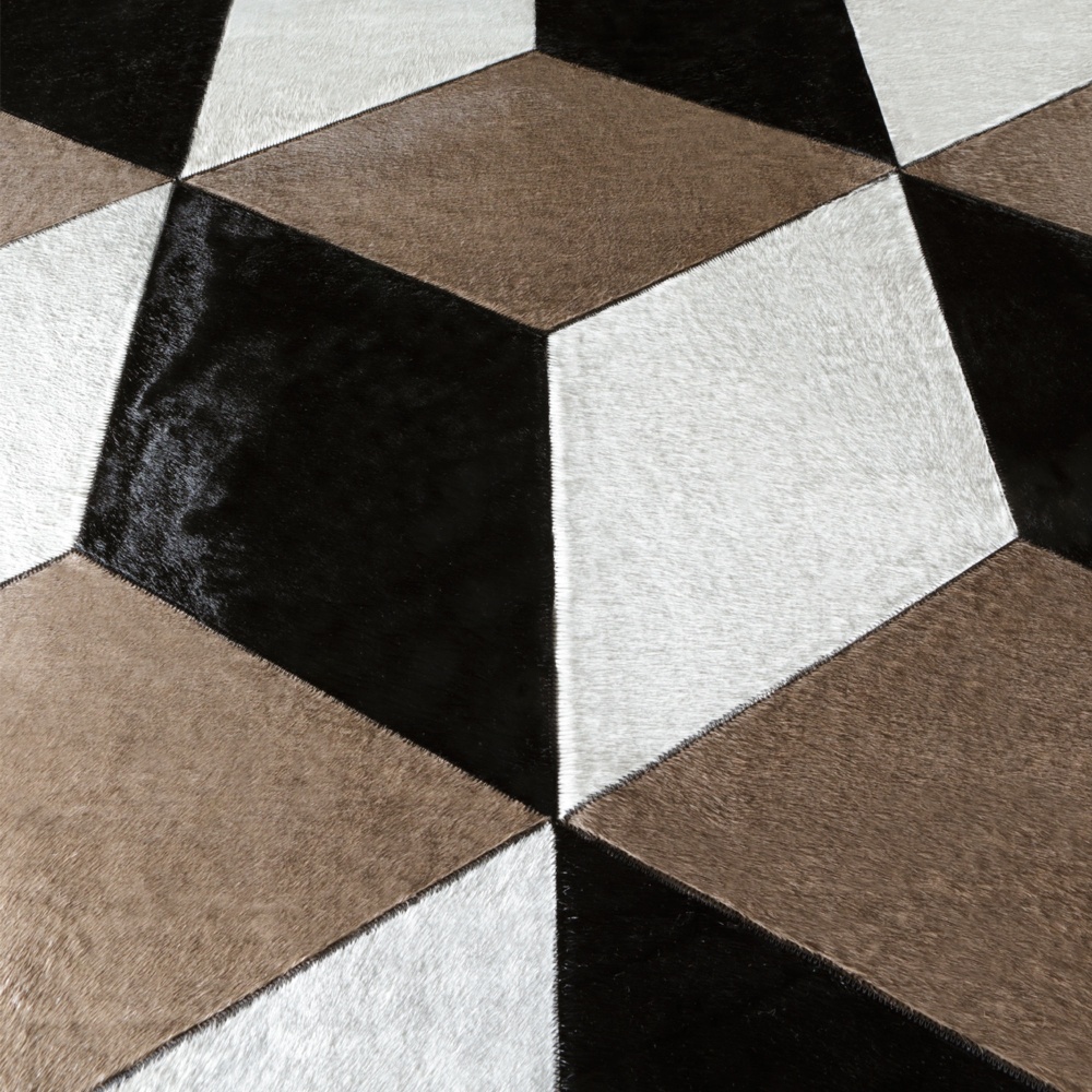 Geometric pattern like the floors of the palazzos of Milan for this cowhide rug.