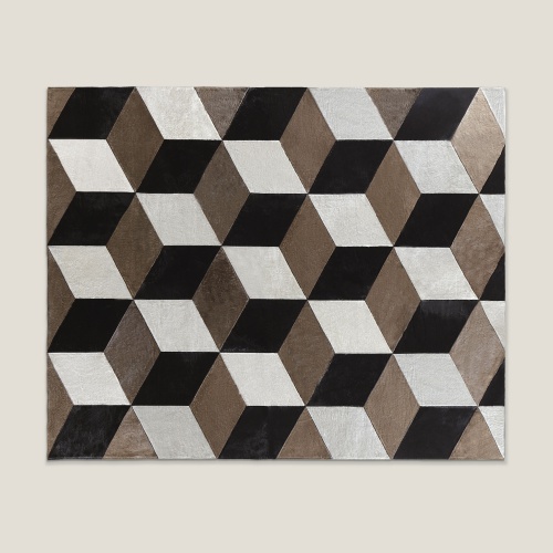 Large rectangular white, blanck and beige hide rug with cubic and repetitive patterns by Maison Norki.