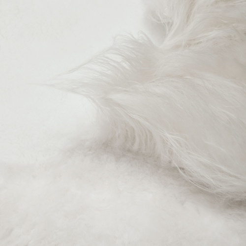 White rug fully lined in sheared and long-haired Icelandic sheepskin.