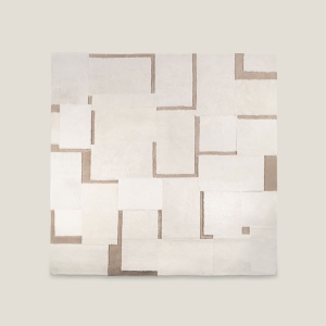 Designer rug in light tones and rectangular patterns. An elegant hides and leather white an beige rug by Norki.