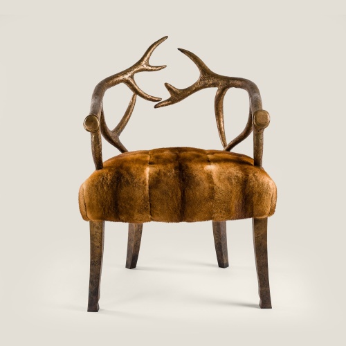 Fauteuil de collection en bronze massif et fourrure de vison. Pièce unique, chez d'oeuvre de l'artisanat français du luxe.