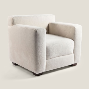 Fauteuil haut-de-gamme blanc au style club et au confort absolu. Le luxe d'une fabrication sur-mesure par Maison Norki.