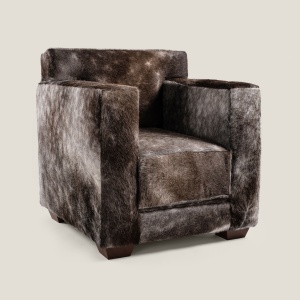 High-end club-style cube armchair in natural hide for a luxury living room with NORKI decor.