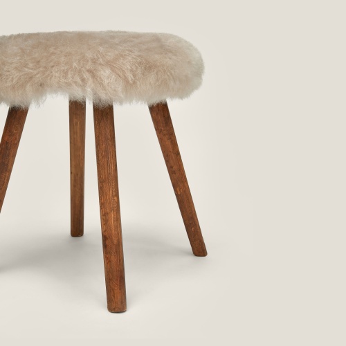 4 legs stool in solid wood and seating in beige sheepskin, handmade in our French workshop