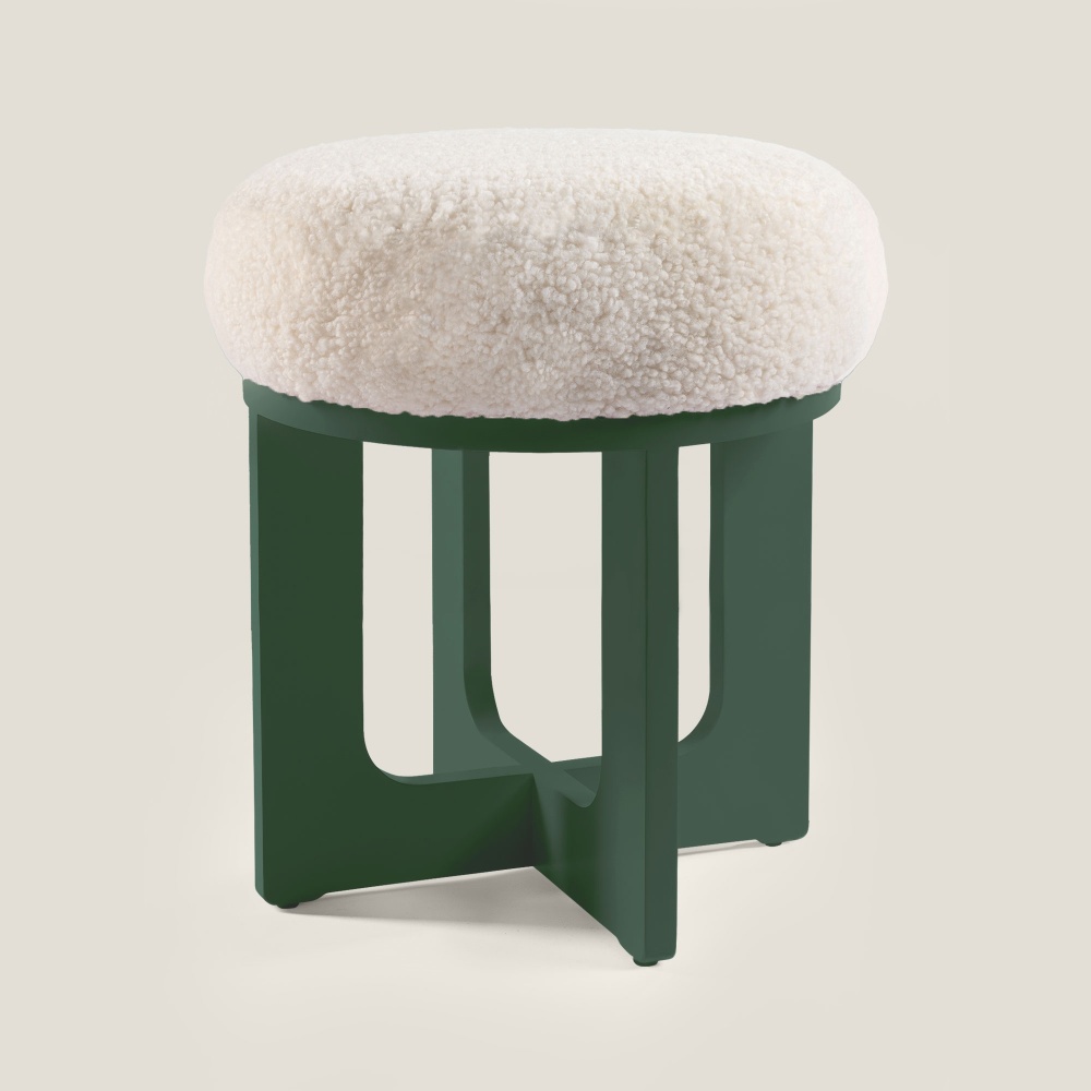 Elegant dark green and white pouf, white shearling seat, lacquered wooden legs by Norki