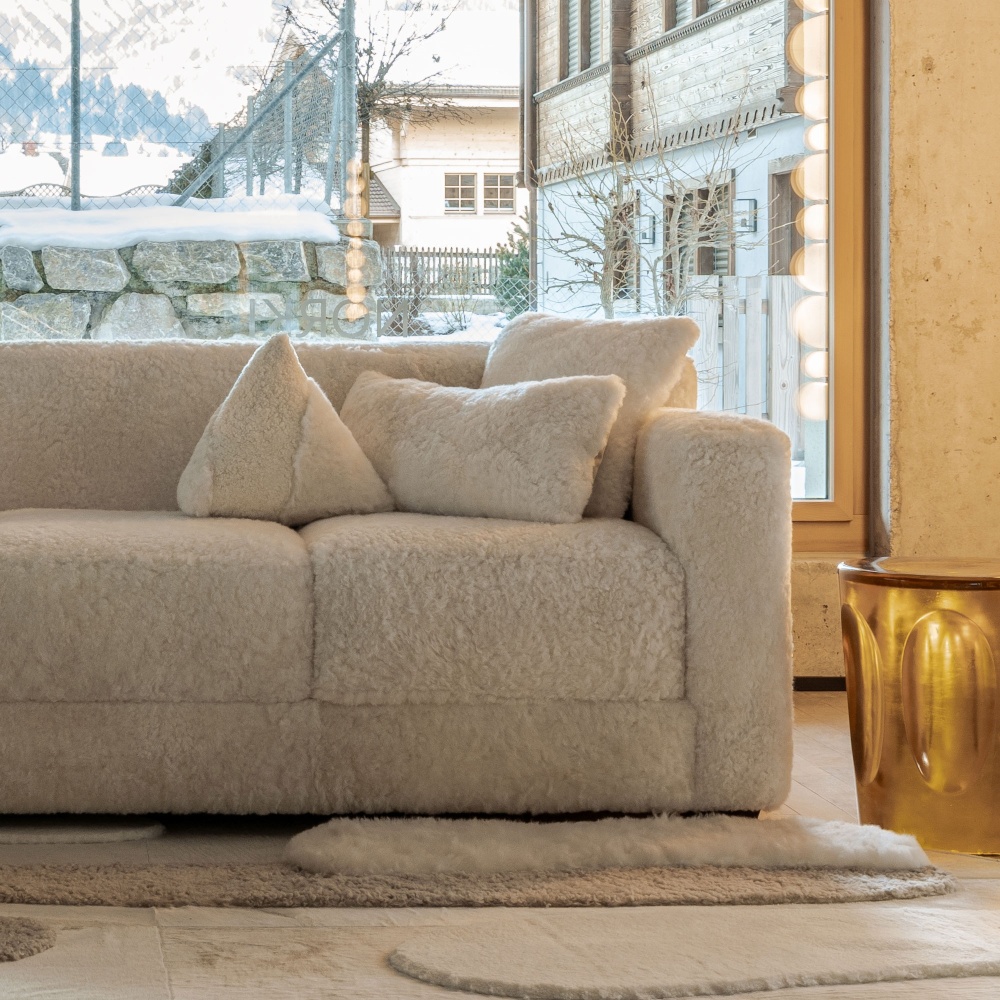 Decorate your sofa with elegant, bold white cushions and high quality design