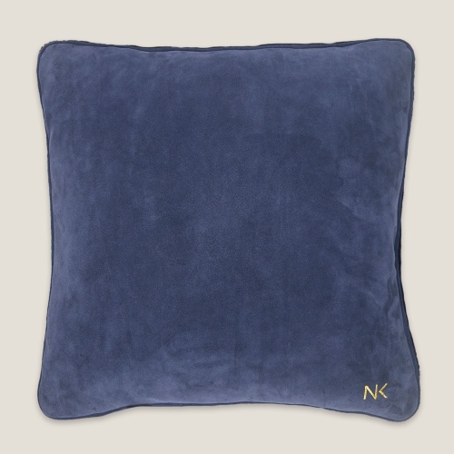 Navy and white leather and sheepskin cushion to decorate your seaside home