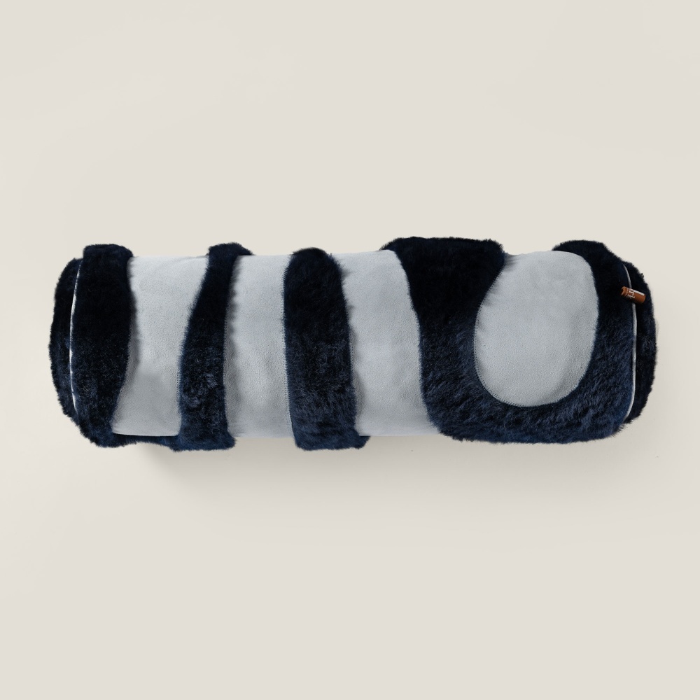 Long, round, navy blue and sky blue haute couture cushion in haute couture leather and sheepskin by Norki