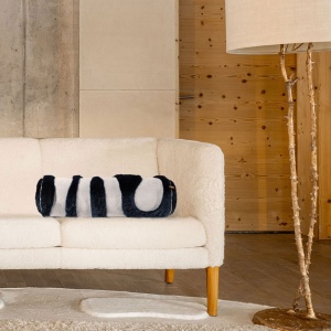 Long, round, navy blue and sky blue haute couture cushion in haute couture leather and sheepskin by Norki