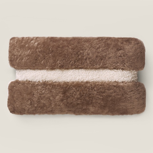 Buy a high-end Norki two-tone rectangle cushion in beige and white sheepskin