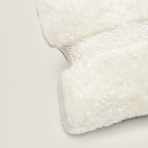 White designer cushion with neat and elegant finishes