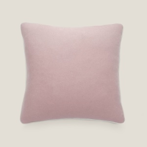 Pink and white square cushion in sheep and cashmere with a knot pattern by Norki.