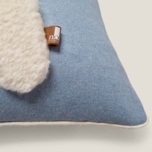 Square snowman or Alsatian Manele cushion in sky blue and white by Maison Norki