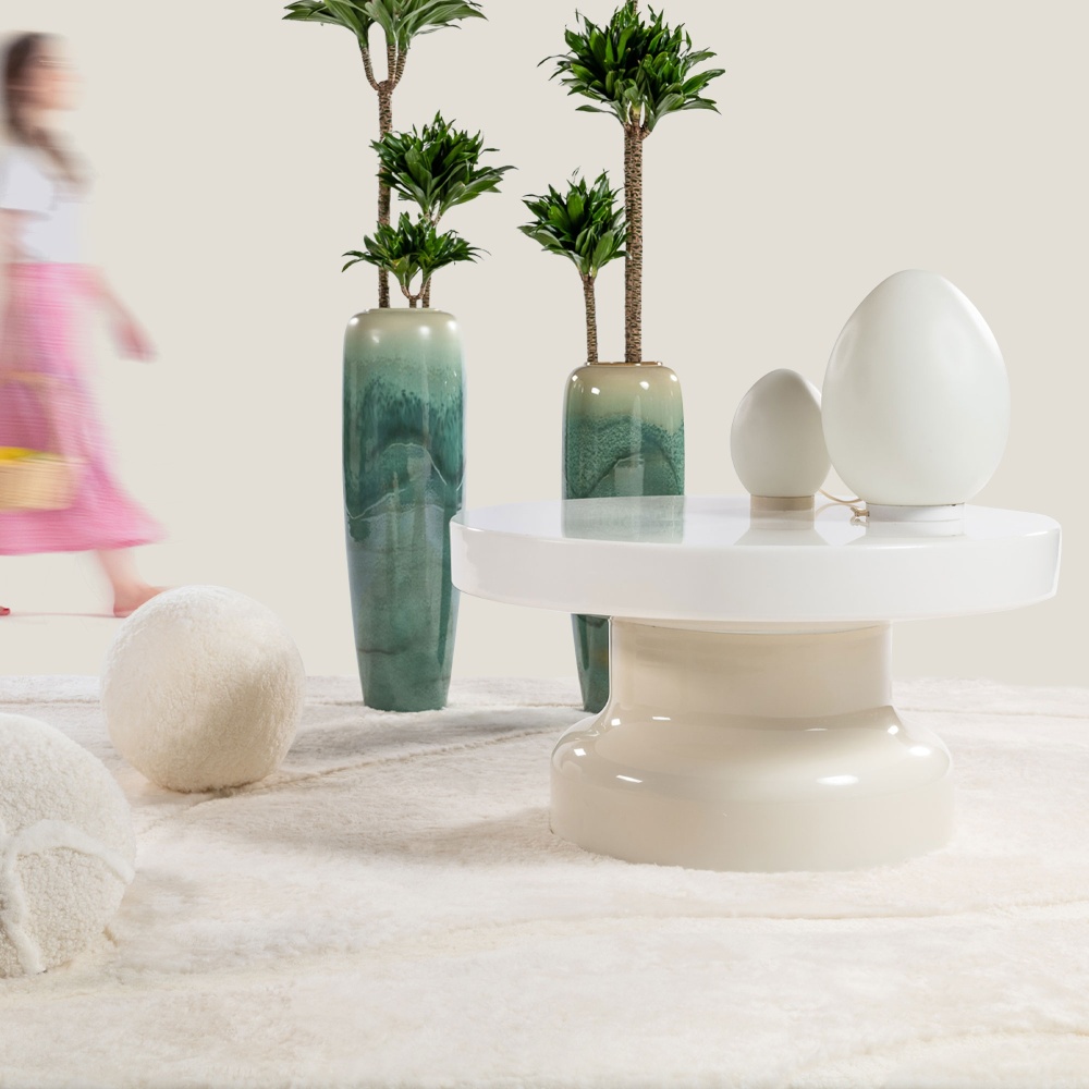 Bumling table by Anders Pehrson, CFOC pots, ball cushion and white rug for a soft decoration