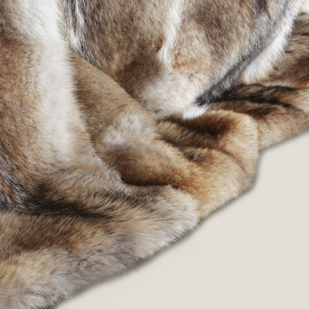 Coyote blanket with haute couture finishes made in France