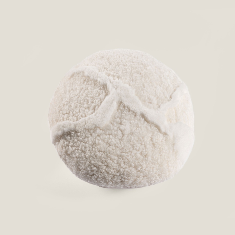 Small round white high-end leather cushion made by Norki