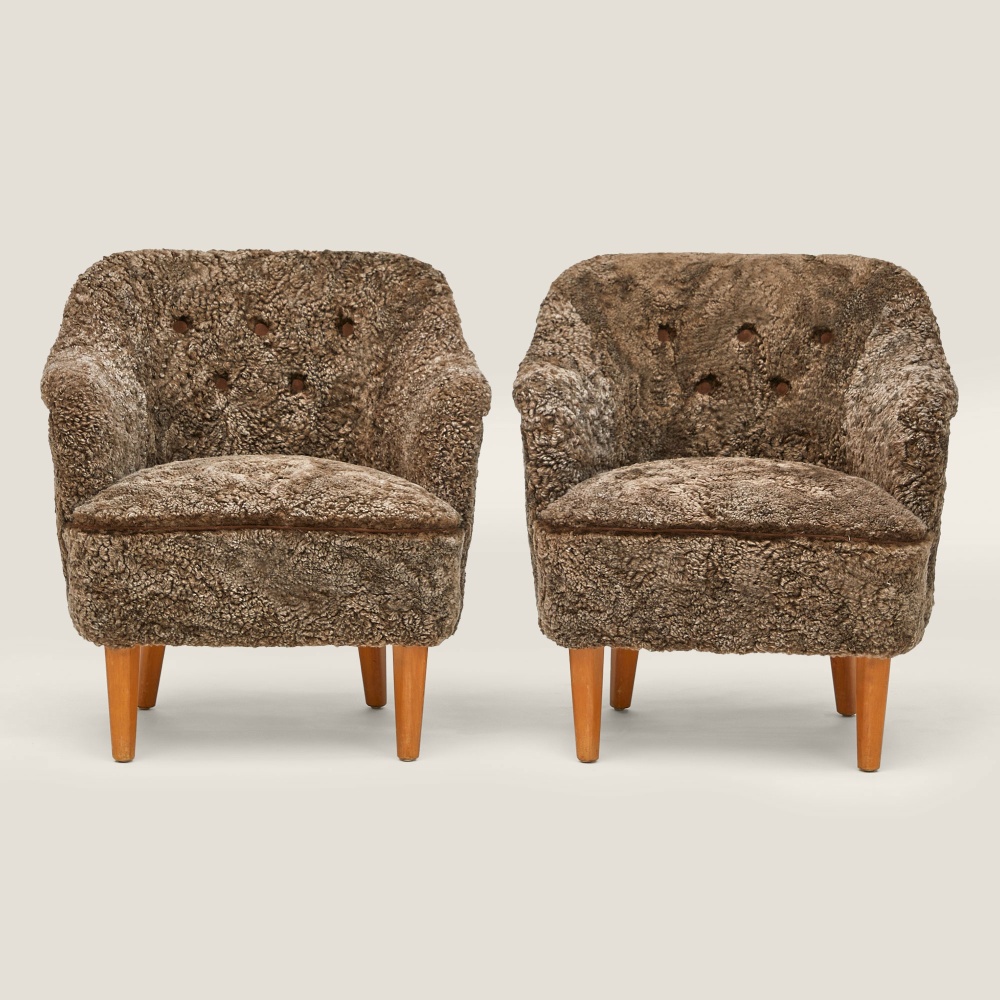 pair of luxurious beige living room armchairs