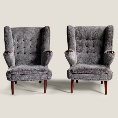 Pair of rare vintage armchairs in gray sheepskin and upholstery with buttoning on the back