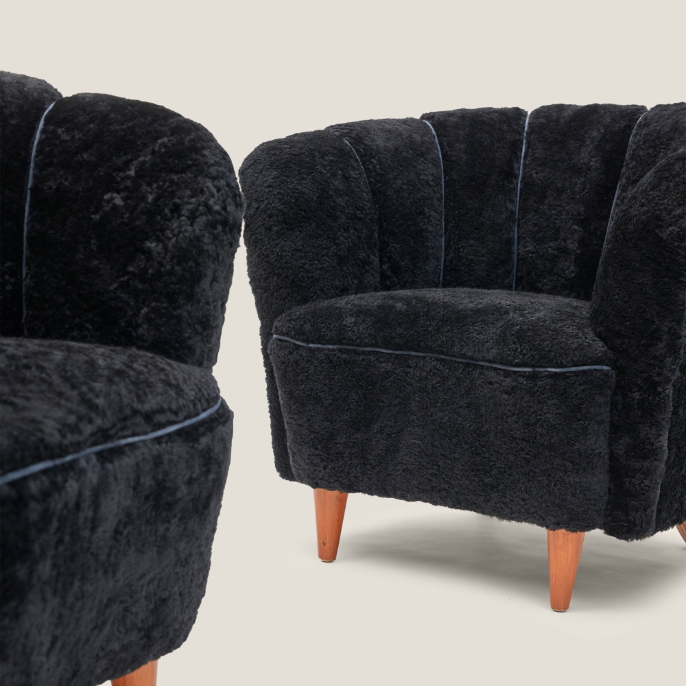 decorate your bedroom with an elegant pair of black sheepskin armchairs