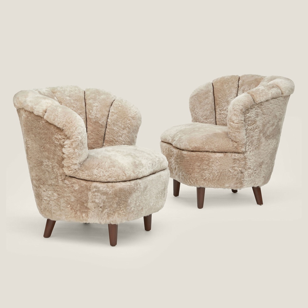 decorate your bedroom with comfortable and elegant beige sheepskin armchairs