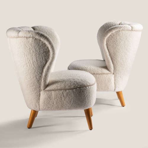 Buy online high quality vintage white shearling armchairs renovated in the Norki workshops