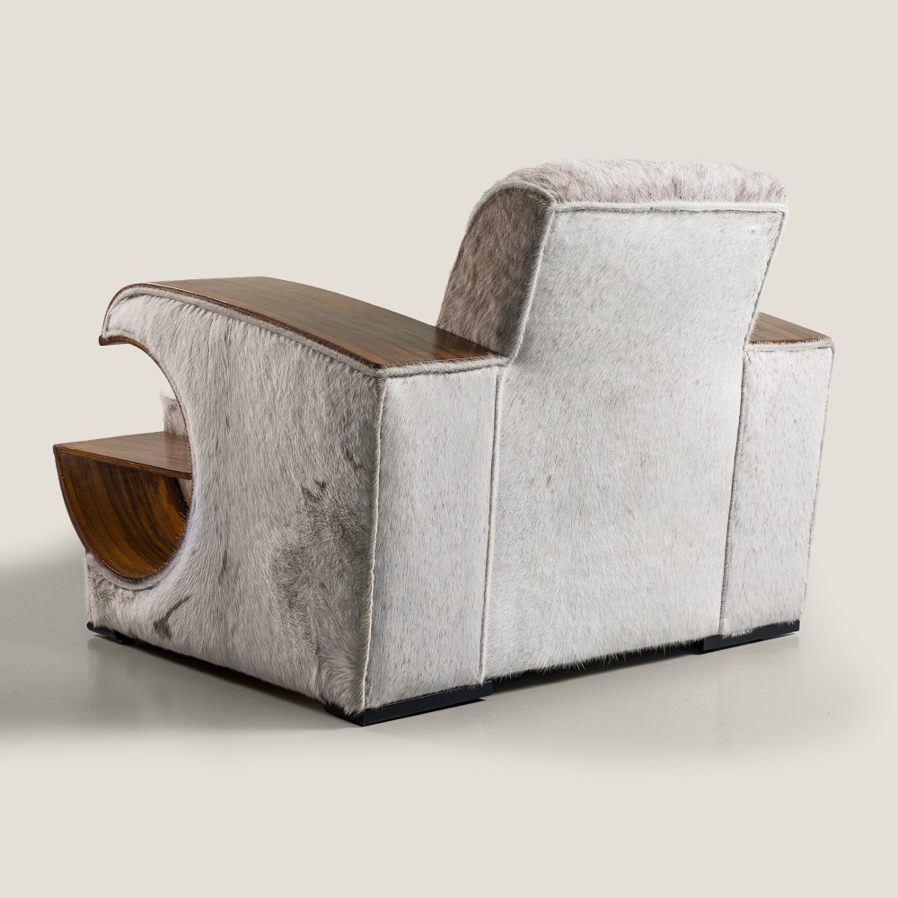 Large armchair with wide backrest and high-end wooden armrests