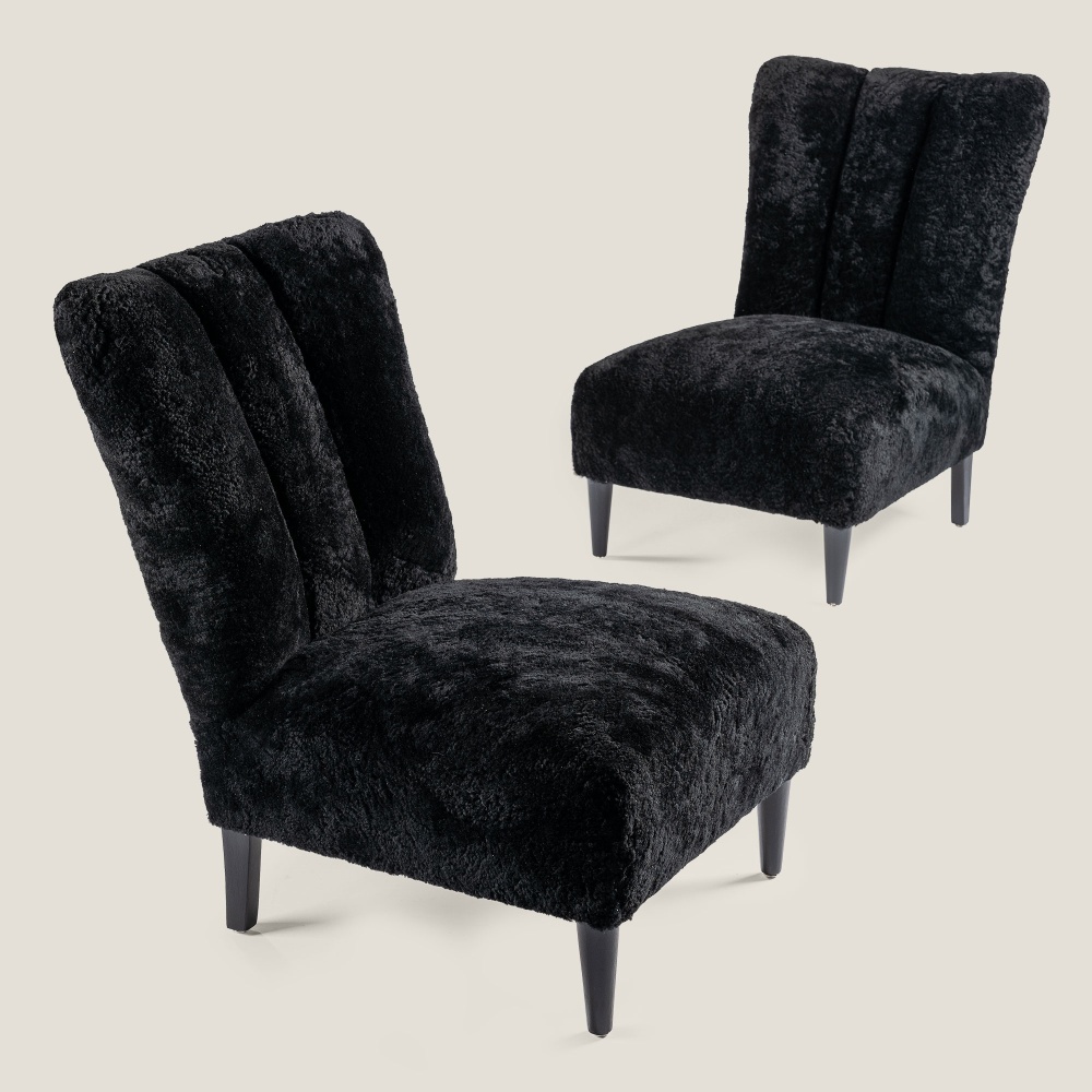 small, elegant and stylish black armchairs, very soft and warm