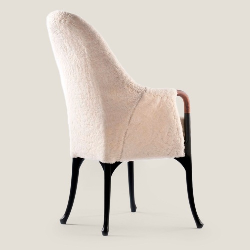 High-end designer white chair with pretty black thin legs